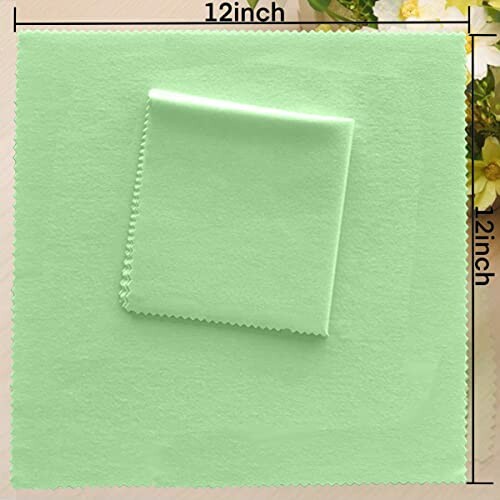 Light green cleaning cloths, one folded on top of another, with 12-inch measurement.