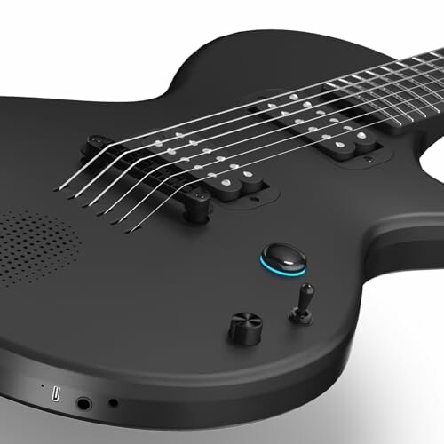 Close-up of a modern black electric guitar with strings and controls.